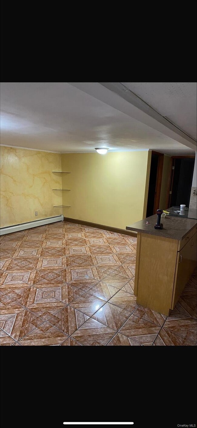 Building Photo - 25-36-36 76th St