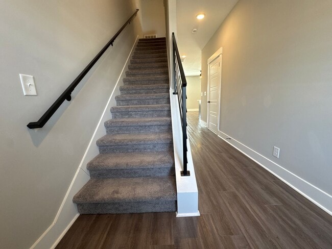 Building Photo - “Stylish 3BR End-Unit | Open Concept | Quartz Kitchen | Garage + Deck