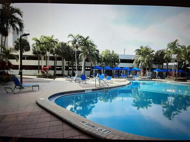 Building Photo - 19370 Collins Ave