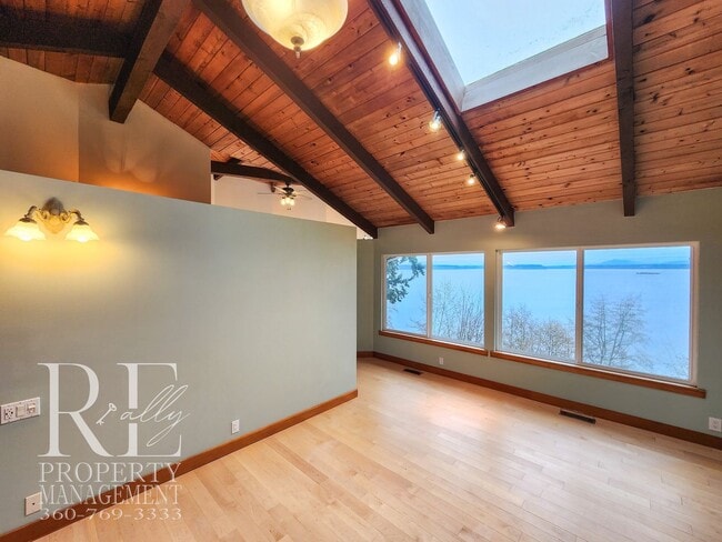 Building Photo - MOVE-IN SPECIAL: 50% OFF FIRST MONTHS RENT - Waterfront Rustic Retreat with Vaulted Ceilings, Pic...