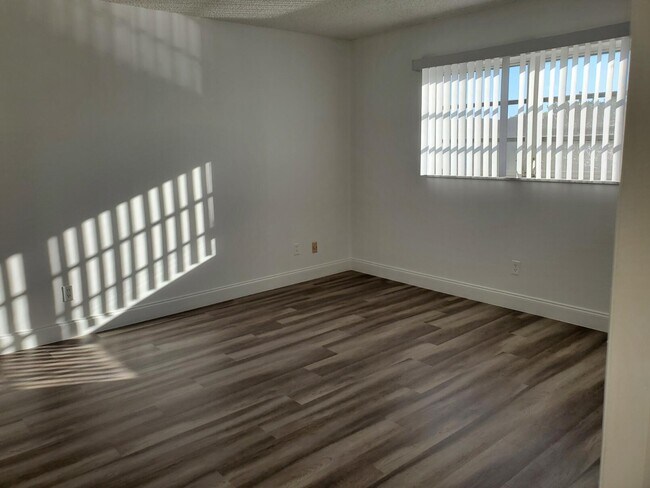 Building Photo - 6050 NW 64th Ave