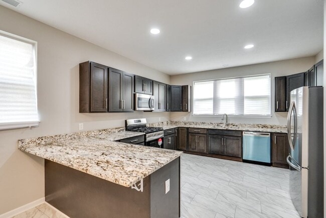 Building Photo - Brand-New 3-Bed, 2.5-Bath Condo: Modern Co...
