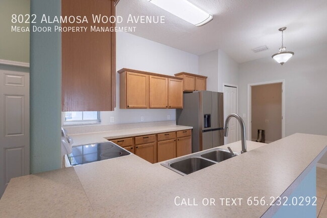 Building Photo - 8022 Alamosa Wood Ave