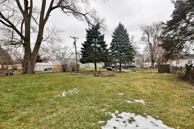 fenced in backyard - 208 Harlem Rd