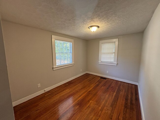 Building Photo - Where Style Meets Serenity — A Spacious, Charming Home in an Unbeatable Central Location