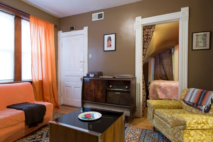 Staged pre-renovation photo of living room - 2640 West Thomas Street
