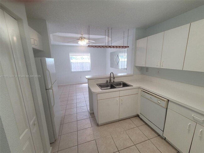 Building Photo - 14385 SW 120th Ct