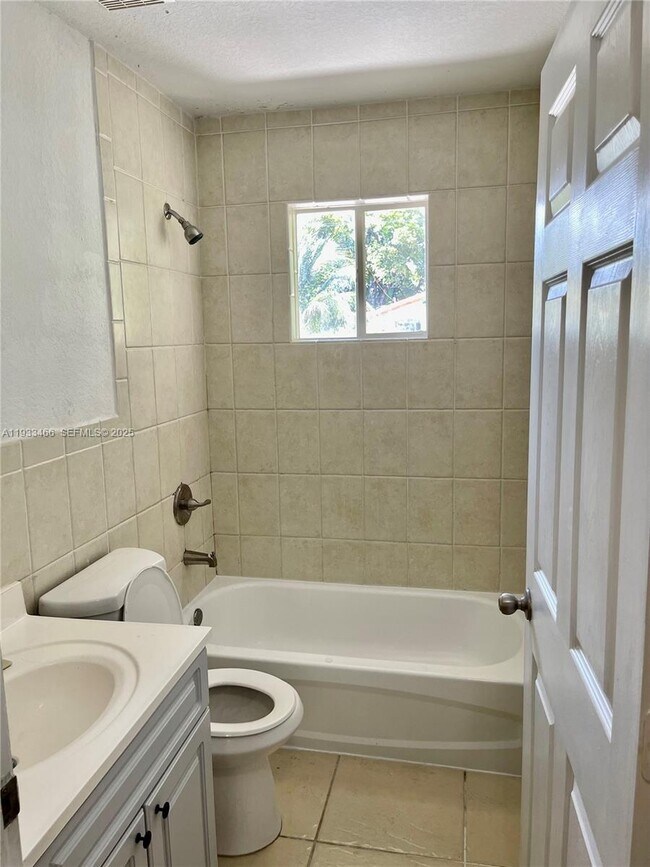 Building Photo - 5857 NW 13th Ave