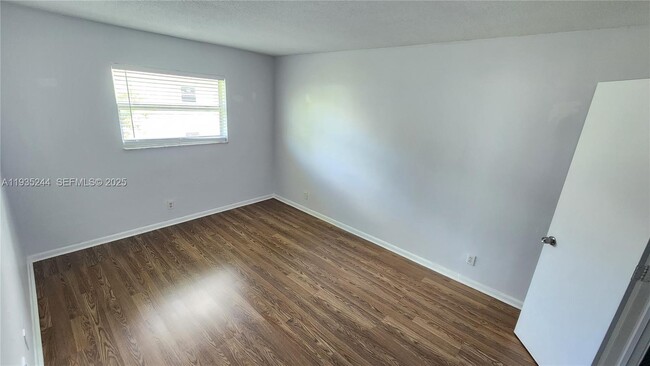 Building Photo - 3090 Coral Springs Dr