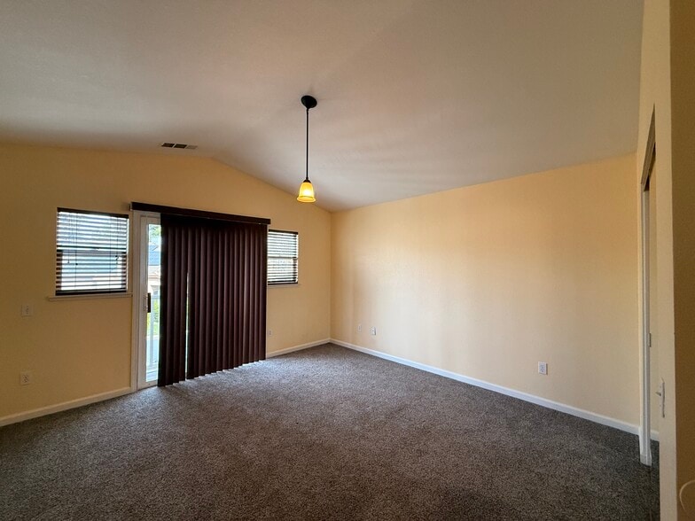 Master bedroom, front doorway, looking toward balcony - 3326 Amberfield Cir
