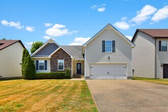 Building Photo - Pet Friendly Three Bedroom with Bonus!