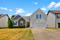 Building Photo - Pet Friendly Three Bedroom with Bonus!
