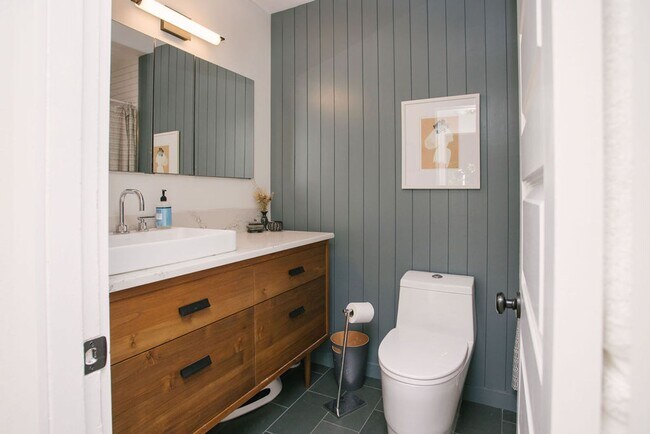 Building Photo - One of a kind house with on-site laundry, ...
