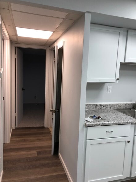 hallway looking back to bedrooms - 306 E Henry St
