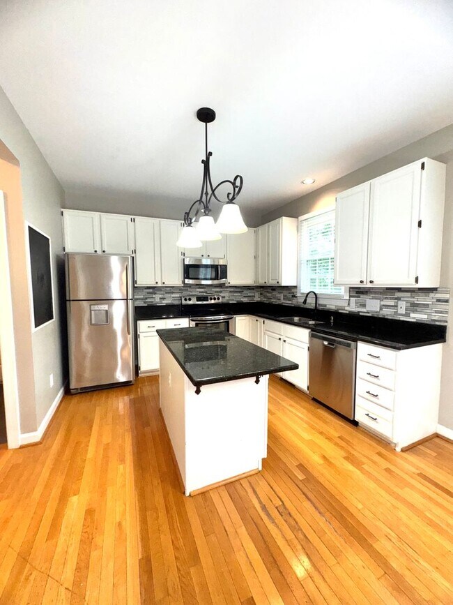 Building Photo - Spacious 4BR 2.5BA Home in Adams Farm with...