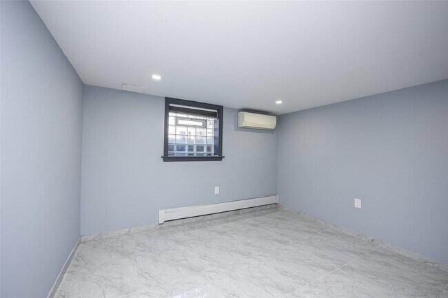 Building Photo - 60-12 171st St