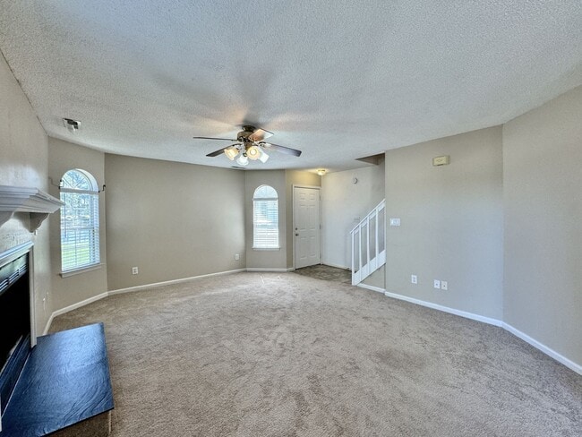 Building Photo - Available 06-15-25! End-Unit Condo w/2 Pri...