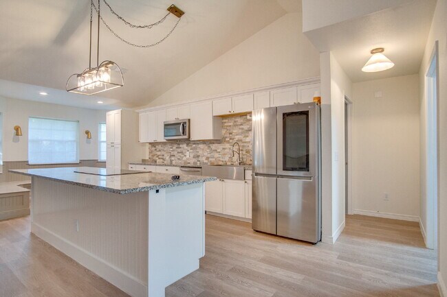 Building Photo - West Pensacola 3BR, 2BA Brick Home Near NAS Pensacola with Screened Porch, Spacious Kitchen & Ope...
