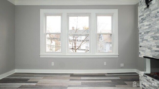 Building Photo - 65-65 Poe Ave