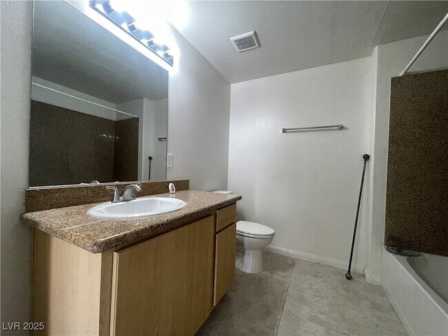 Building Photo - 8000 W Badura Ave