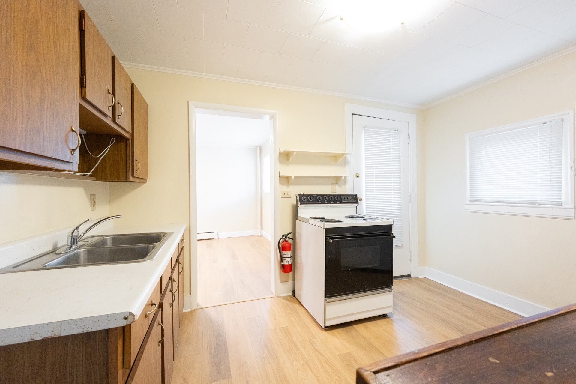 Kitchen towards living room and porch door - 39 Homer Ave
