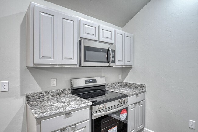 Building Photo - New Construction in Varenna Landing! Storm shelter and lawn care included!