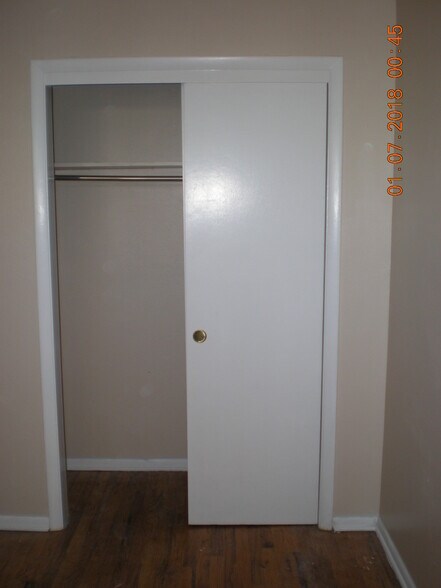 Large closet in upstairs master bedroom with wood floor - 1160 Clinton St