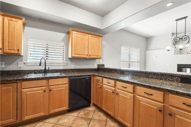 Building Photo - "Spacious 4-Bedroom Retreat in El Paso wit...