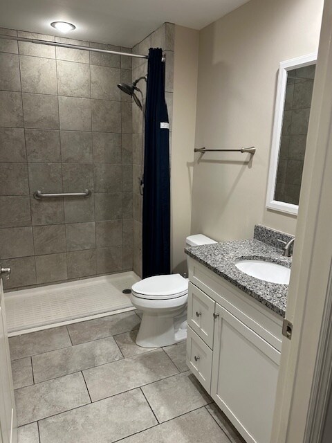 Second bathroom has a roll-in wheelchair accessible shower - 2350 Montevallo Rd