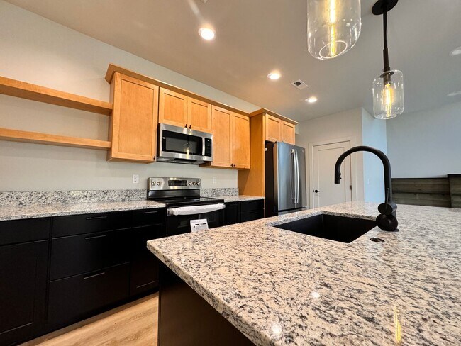 Building Photo - Modern, Spacious 3-Bedroom Townhome in the...