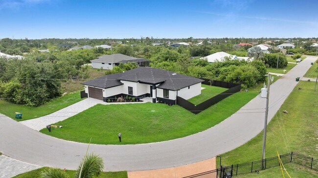 Building Photo - Brand-New Pool Home for Rent – Port Charlo...
