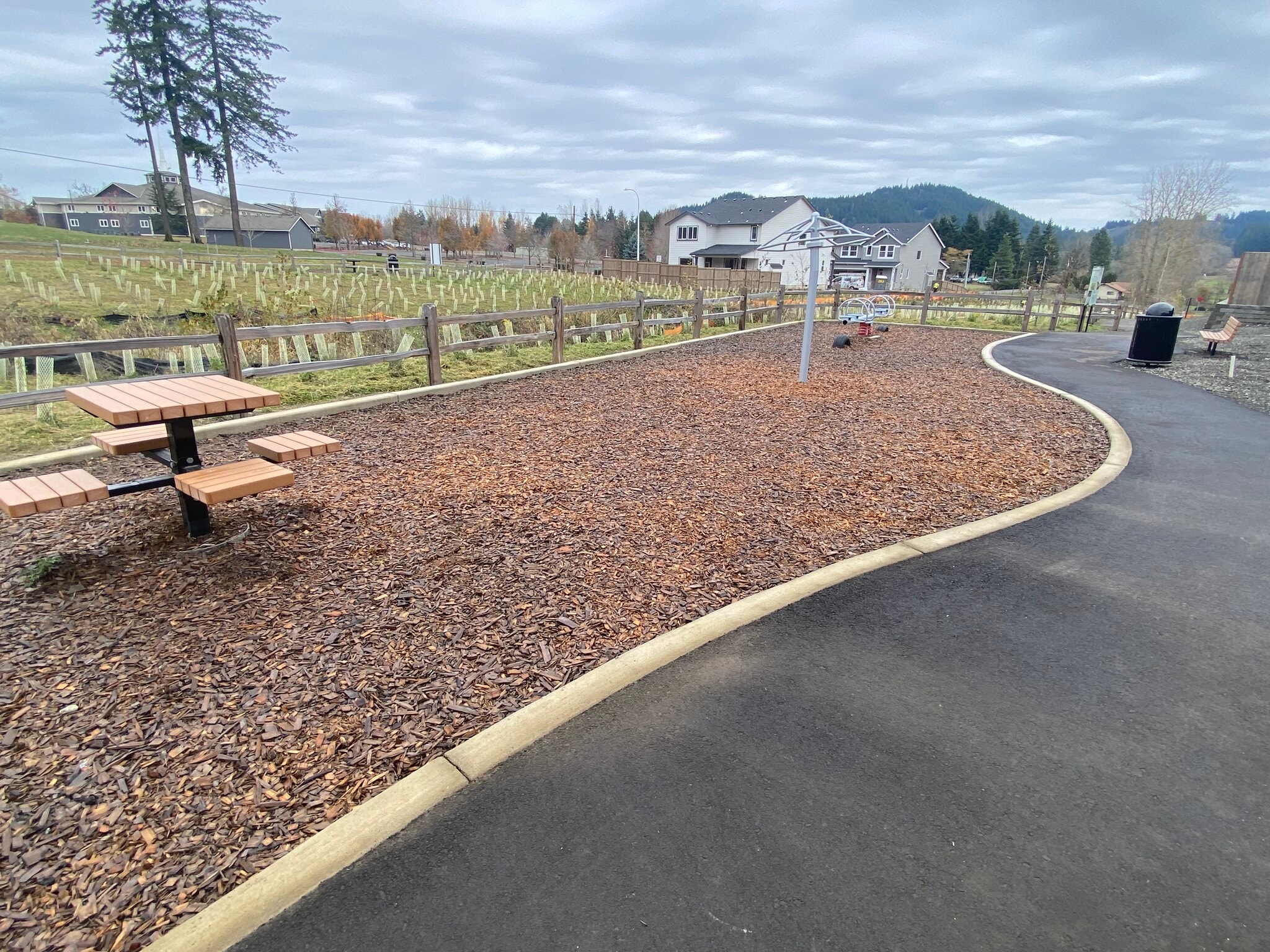 walking path with picnic bench - 17366 SE Hemrich Rd