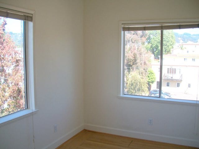 Building Photo - Newly Remodeled corner unit small 2-bedroom with a full kitchen and lots of light