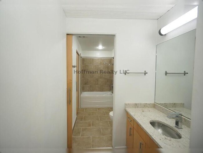 Building Photo - Chanel Side Condo