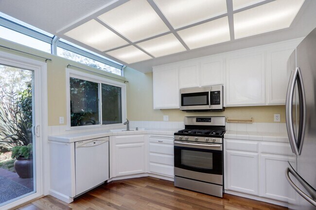 Building Photo - 3BR/3BA Pet-Friendly Village In The Park Townhome with Pool & 2-Car Garage | YouTube Tour