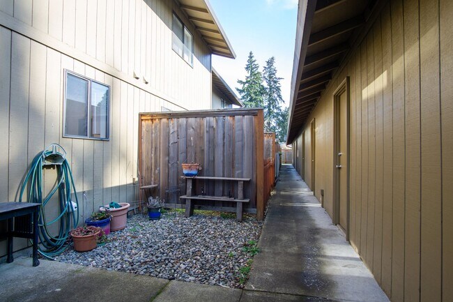 Building Photo - Updated Townhouse with Garage, Patio, DW, WD + FIREPLACE!!