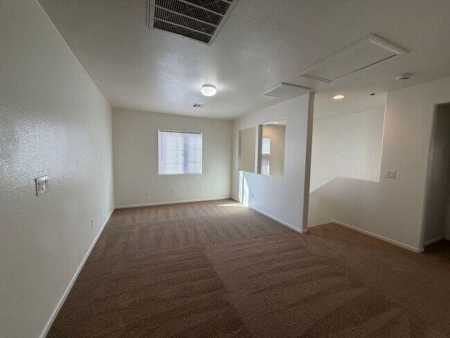 Building Photo - Discover a refreshed 4-bedroom, 2.5-bath home in Las Vegas 89149