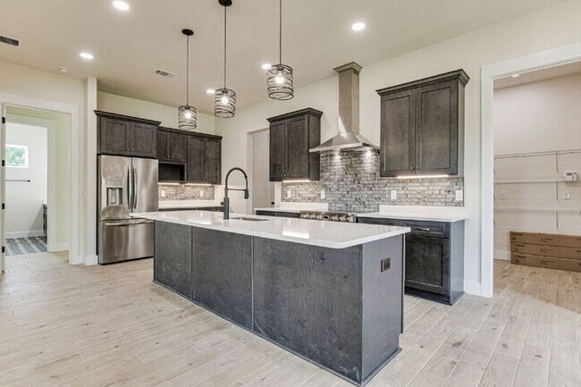 Building Photo - This luxurious new custom home in the sought-after Shadow Grove subdivision is a masterpiece of m...