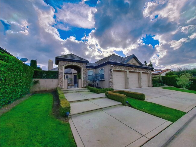 Building Photo - Custom Clovis Residence in Gated Community | Spacious Layout & 3-Car Garage!