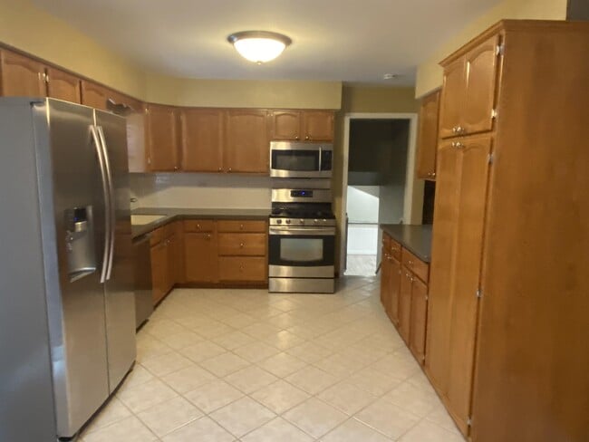 Building Photo - 1325 W 75th Pl