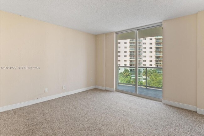 Building Photo - 19390 Collins Ave