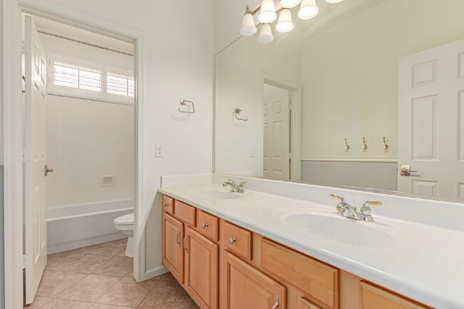 Building Photo - "Charming 2-Bedroom + Den Oasis with Spaci...