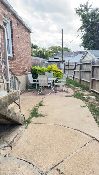 Backyard Patio w privacy fence - 9115 Rambler Dr