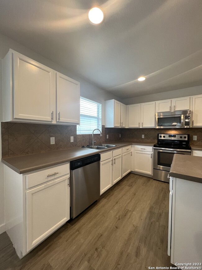 Building Photo - 9116 China Rose Dr