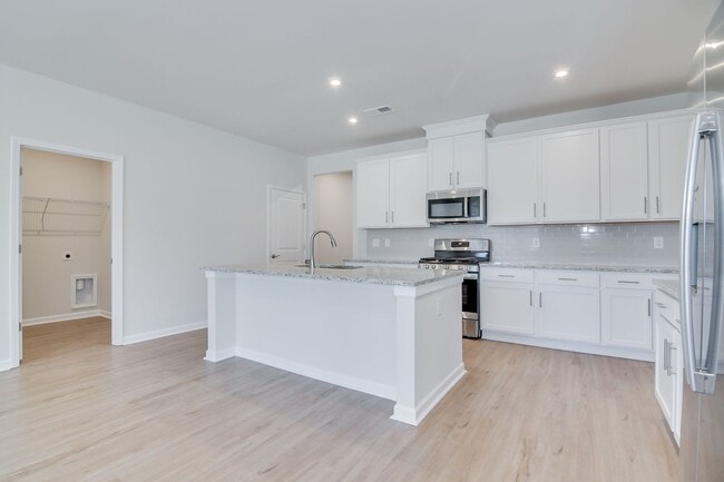 Building Photo - Stunning 4-Bedroom, 3-Bath New Construction Home with Master on Main and Upstairs Retreat