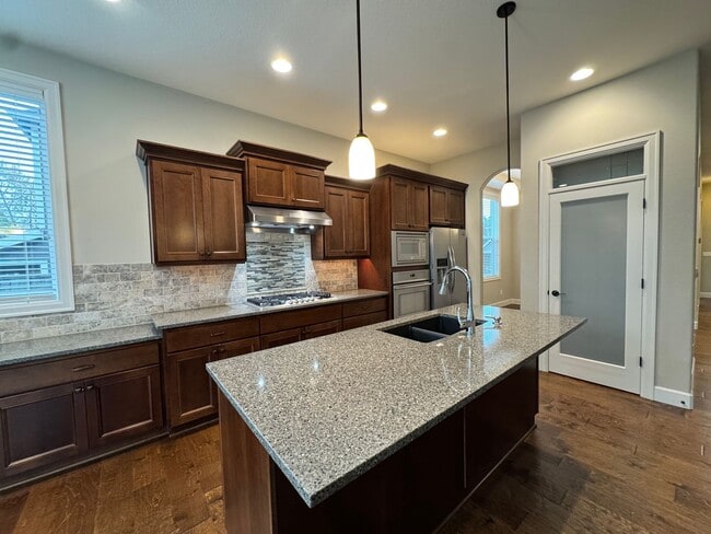 Building Photo - FOR RENT UNFURNISHED: Beautifully maintained 2015 Noyes-built home, 5 bed, 3 bath, 2 car garage w...