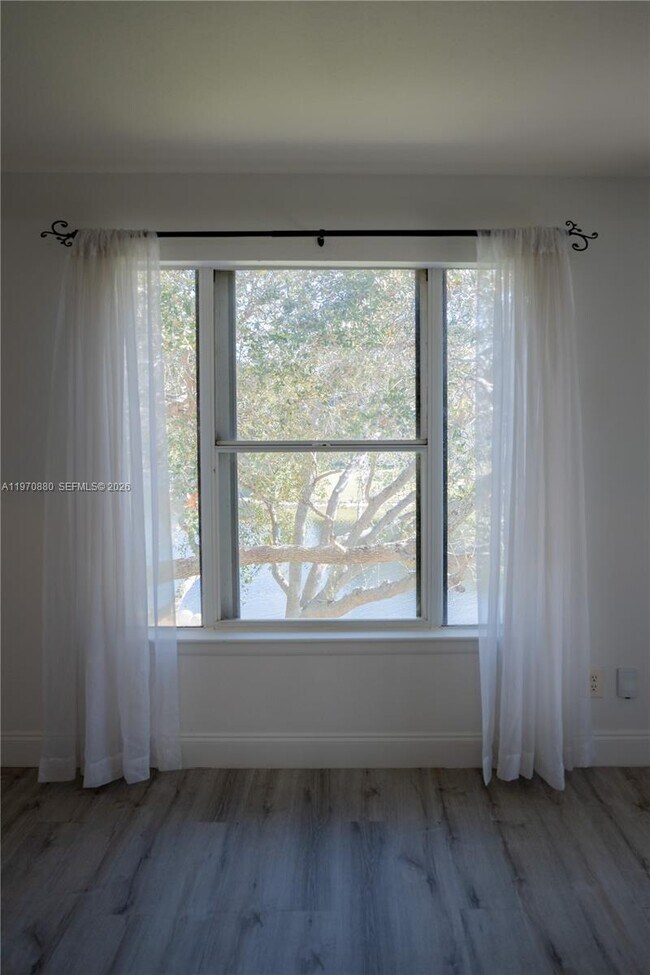 Building Photo - 1865 Palm Cove Blvd