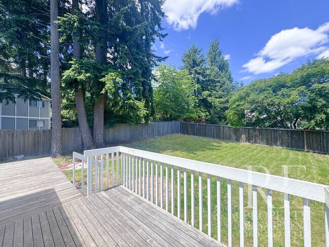 Building Photo - Spacious Poulsbo Home with Large Basement, Fenced Yard & Garden Space