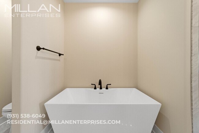 Building Photo - Gated Community Living with Open Views & Designer Kitchen - Experience Elevated Living with a Com...