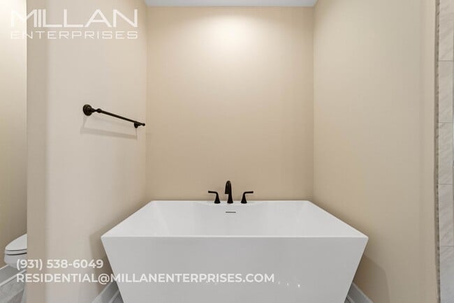 Building Photo - Gated Community Living with Open Views & Designer Kitchen